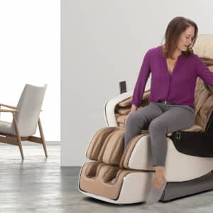 woman settling into a massage chair
