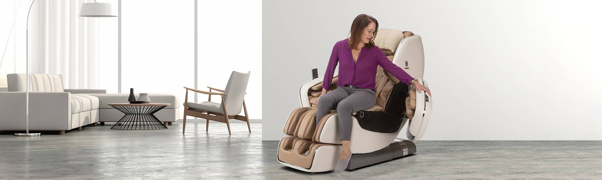 woman settling into a massage chair