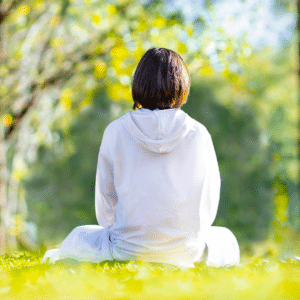 Woman sitting in a forest