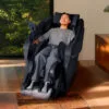 Panasonic MAN1 5D A.I. Massage Chair black in a living room setting