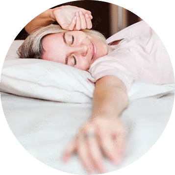 Woman sleeping peacefully in bed