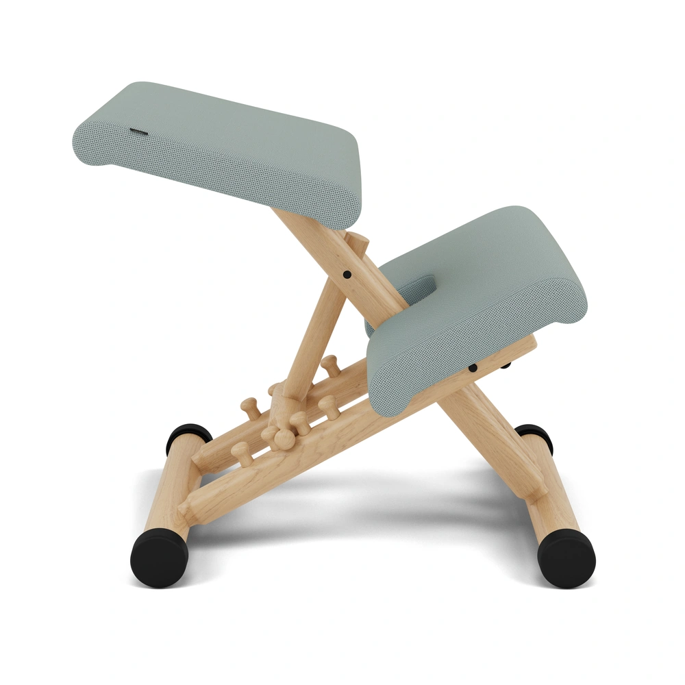 Varier Multi kneeling chair in Tonal Light Green fabric with natural wood base