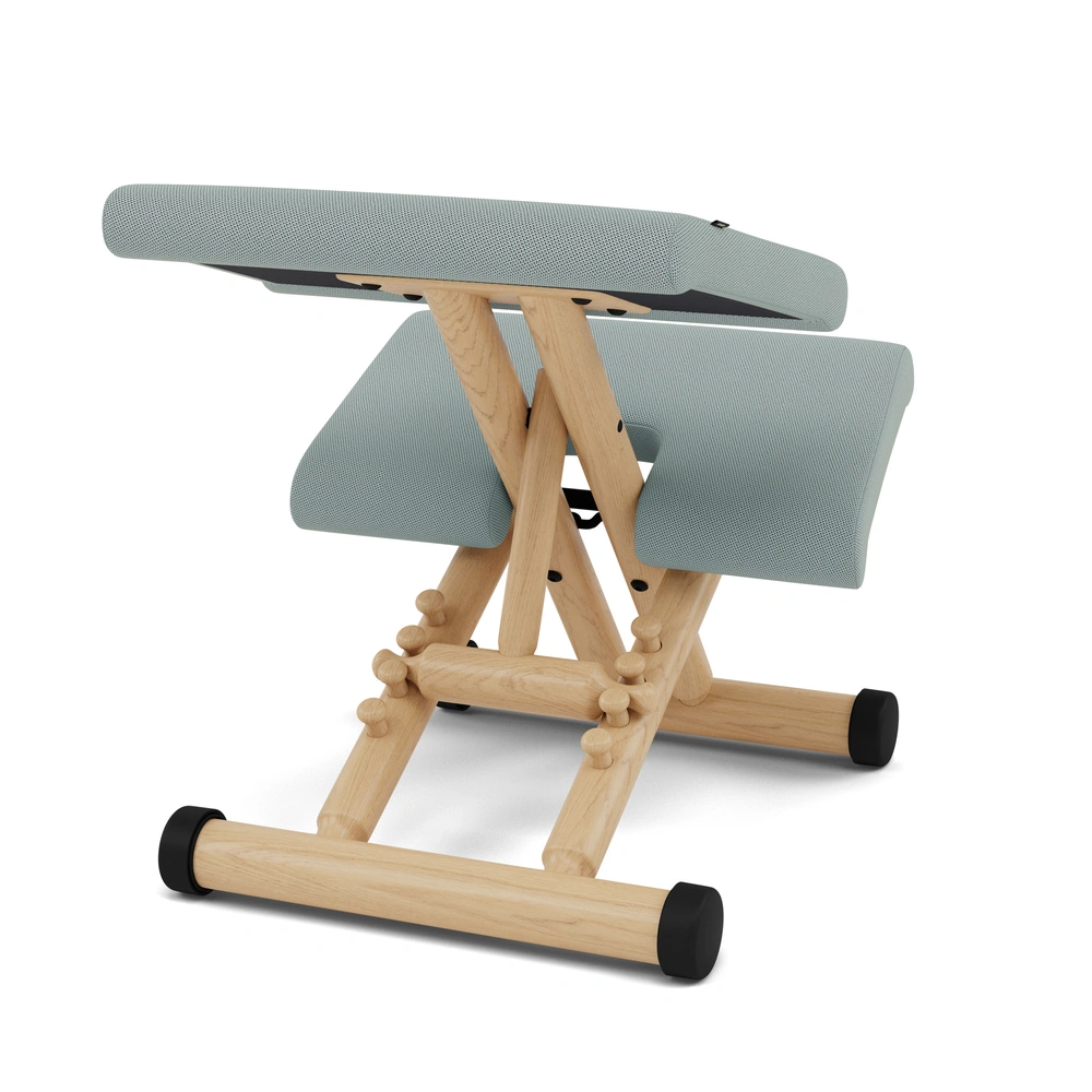 Varier Multi kneeling chair in Tonal Light Green fabric with natural wood base
