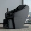 Panasonic MAN2 black 5D A.I. massage chair on a white background.